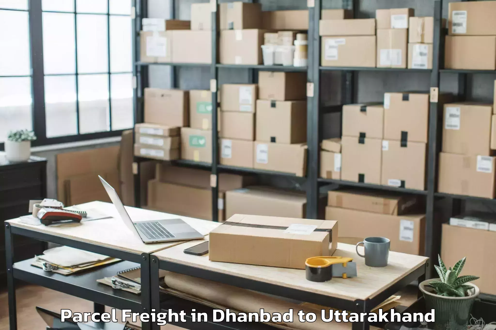 Book Your Dhanbad to Kapkot Parcel Freight Today